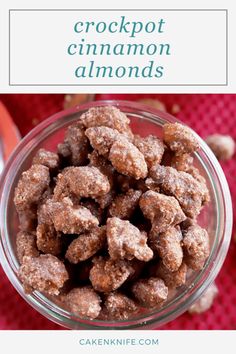 crockpot cinnamon almonds in a glass bowl on a red cloth with text overlay