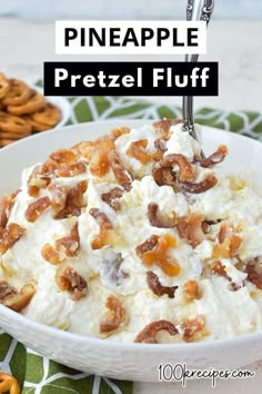 a white bowl filled with pretzel fluff next to pretzels