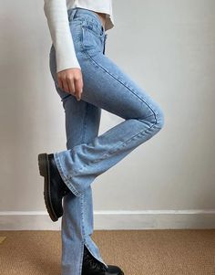 The Tala Cowgirl Split Jeans feature a high-waist boyfriend style design with an exaggerated bottom split. Available in Medium-Wash, Light-Wash and Black. Details: Denim Cold Hand Wash / Warm Iron On Reverse Available in Medium-Wash, Light-Wash and Black Size / Fit: Runs true to size Model wears a Small Model Info: Chest 82 cm Waist 65 cm Hips 88 cm Height 165 cm SIZE CHART Hips Waist Length XS 87 cm 61 cm 108 cm Small 91 cm 65 cm 109 cm Medium 95 cm 69 cm 110 cm Large 99 cm 73 cm 111 cm Split Bottom Jeans Outfit, Trendy Solid Color Denim Bottoms, High Waist Flare Jeans Casual Style, High Waist Solid Color Flare Jeans, High-waisted Denim Pants In Solid Color, High Waist Solid Flare Jeans, High-waist Solid Color Denim Flare Jeans, Trendy High-waist Flare Jeans, Solid Color High-waisted Denim Pants