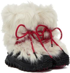 Mid-calf faux-fur boots in white. Canvas trim throughout. · Rubber cap toe · Wraparound lace-up closure · Drawstring at collar · Logo printed at outer side · Pull-loop at heel tab · Logo embossed at rubberized heel counter · Faux-fur lining · Sculptural rubber platform midsole · Cleat-style lug rubber outsole · Platform: H1.5 in Supplier color: White White Snow Boots For Winter, White Winter Snow Boots, White Sheepskin Boots For Winter, White Sheepskin Winter Boots, Winter White Sheepskin Boots, White Boots With Faux Fur Lining For Fall, White Faux Fur Lined Boots For Fall, White Insulated Winter Boots, White Leather Lace-up Boots For Winter