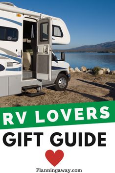 an rv with the words rv lovers gift guide on it, in front of a lake