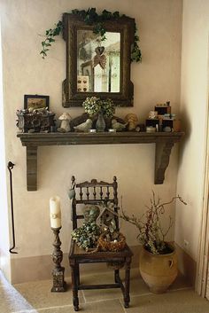 a living room with a chair, mirror and potted plants on the shelf above it