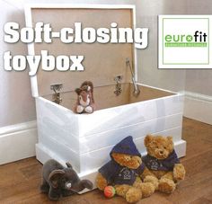 two teddy bears sitting in a toy box with the words soft - closing toysbox