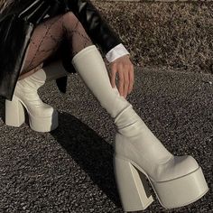 Off-white faux leather calf-height chunky platform boots! These have a slim stretchy calf with side zipper and a platform that will elongate your leg and edge up any outfit. Perfect for all the holiday stuff. Runs true to size Chic Knee-high Chunky Platform Boots, White High Heel Platform Boots With Chunky Platform, Chic Knee-high Boots With Chunky Platform, White Faux Leather Platform Boots For Party, Faux Leather Knee-high Boots With Chunky Platform, Trendy White Knee-high Heeled Boots, White High Ankle Platform Boots, Trendy Chunky Platform Knee-high Boots, High Ankle Platform Boots With Chunky Platform