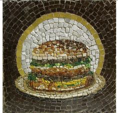 a large hamburger made out of small tiles