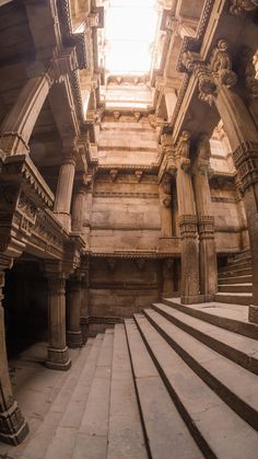 the inside of an old building with stone stairs