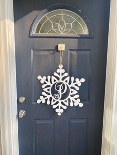 PLEASE NOTE:  WE CANNOT GUARANTEE ON TIME ARRIVAL FOR CHRISTMAS DELIVERY ON ANY ORDERS PLACED AFTER DECEMBER 4.  THANK YOU FOR AN AMAZING YEAR!   Our door hangers are made from 1/4" wood.  Sealed with clear acrylic. We do not recommend this item be left out in the direct elements. A door with an overhang or porch is recommended. Hanger Snowflake, Snowflake Monogram, Monogram Signs, Christmas Door Hanger, December 4, Left Out, Christmas Delivery, Christmas Door, Wedding Basket