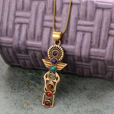 7 Stone Pendant Ancient Egypt jewelry, Egyptian jewelry, antique jewelry, historical vintage jewelry, Handmade Designer Colorful Pendant Handmade Material:- Brass ♥ Customer satisfaction is our biggest priority, please contact us with any questions/queries for future or existing orders, and we will do our best to make sure you are happy with your order. ♥ Please Make Sure to Include The Correct Address During Before Ordering. You Can return the Item within 30 Days After Successful Delivery. We offer a 100% Money Back Guarantee If You Are Not Satisfied With Your Purchase. Return Charge Will Be Paid By Buyer Only. ♥ The ring can be customized on request and the gemstone can be made to any gem you want. The same Design Ring Is Upload With Any Gemstone. Please Visit Our Shop to View the Comple Vintage Multicolor Multi-stone Jewelry, Antique Gold Spiritual Brass Jewelry, Spiritual Antique Gold Brass Jewelry, Antique Gold Brass Spiritual Jewelry, Unique Multicolor Brass Jewelry, Multicolor Round Copper Jewelry, Antique Multi-stone Pendant Necklace, Spiritual Antique Gold Jewelry With Antique Finish, Antique Gold Multi-stone Necklace