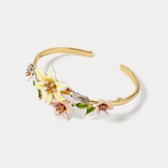 Step into the enchanting world of our Fluffy Bunny Cuff Bracelet – a delightful nod to nature's wonders! This charming piece captures the essence of a blooming garden with intricate enamel details, while the 18k gold adds a touch of luxury. Embrace the playful spirit of our adorable bunny design, bringing joy and style to your wrist. A perfect choice for nature lovers! 🐰🌼 🌿 DETAILS Plating: 18K Gold Materials: 18K Gold on Brass,   Enamel, Cubic Zirconia Size: Adjustable 2.17"*2.0 5 "(5.5cm*5. Luxury Round Cuff Bracelet, Luxury Bracelet With Flower Charm, Luxury Gold Flower-shaped Bracelets, Luxury Flower Charm Bracelet Jewelry, Luxury Fine Jewelry Flower Bracelets, Luxury Flower-shaped Bracelet As A Gift, Luxury Elegant Jewelry With Flower Charm, Luxury Jewelry With Spring Ring Clasp For Gift, Luxury Spring Jewelry Gift