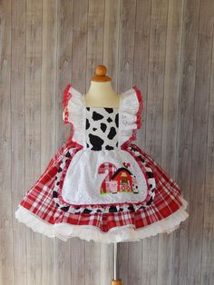 This beautiful dress is perfect for a birthday Farm theme party . The dress is made with 100% cotton fabric and all attention to detail This dress is made with 2 skirt layers, it has a farm appliqué with a birthday number that looks so cute on the dress just perfect for your little angel. The Dress is available from sizes 2 -8 years and available with a birthday number. Girls size Chest 2T 19'' 3T 21'' 4T 22'' 5T 23'' 6 24'' I use an underskirt just to show how puffy is the dress. if you want a Birthday Farm Theme, Farm Costumes, Farm Girl Outfits, Skirt Layers, Cow Dress, Woman Costumes, Animal Dress, Farm Dress, Farm Themed Birthday Party