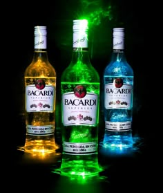 three bottles of bacardi light up the night