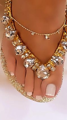 Bling Open Toe Sandals For Beach, Gold Open Toe Sandals With Bling, Gold Bling Open Toe Sandals, Gold Glitter Sandals For Summer, Glamorous Gold Sandals With Adjustable Fit, Adjustable Glamorous Gold Sandals, Elegant Gold Beach Sandals, Glamorous Adjustable Gold Sandals, Gold Rhinestone Flip Flops For Vacation