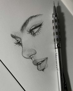 a pencil drawing of a woman's face