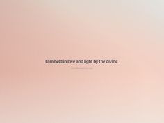 a pink background with the words i am held in love and light by the divine