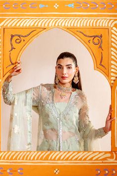 Brand: NeeshayCollection: Neeshay Parinaaz Unstitched Wedding Formal CollectionFabric: Organza PRODUCT DETAILS: Organza Embroidered And Hand Embellished Left Panel (1 Pc) Organza Embroidered And Hand Embellished Right Panel (1 Pc) Organza Plain Dyed Back (1 M) Organza Embroidered And Hand Embellished Sleeves (0.66 M) Organza Embroidered And Hand Embellished Right Panel Border (1 Pc) Organza Embroidered And Hand Embellished Left Panel Border (1 Pc) Organza Embroidered And Hand Embellished Front Border (1 M) Organza Embroidered And Hand Embellished Back Border (1 M) Organza Embroidered And Hand Embellished Sleeves Border (1 M) Organza Foil Printed And Embroidered Dupatta (2 M) Organza Embroidered Dupatta Pallu (2 Pcs) Foil Printed And Dyed Rawslik (5 Yards) DISCLAIMER:* Lining, Laces, and Ta Pista Green Gown With Cutdana Detailing, Pista Green Cutdana Gown, Pista Green Gown With Cutdana, Elegant Pista Green Organza Choli, Chanderi Wedding Set Floor-length, Wedding Chanderi Floor-length Sets, Floor-length Chanderi Wedding Sets, Pista Green Sharara With Sheer Dupatta For Reception, Traditional Pista Green Wedding Gown