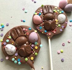 two chocolate lollipops with easter eggs on them