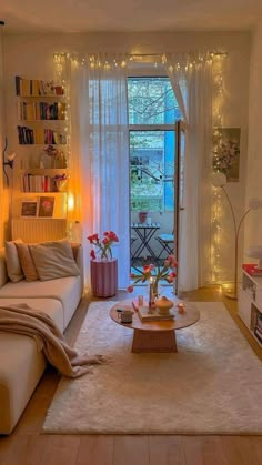 a living room filled with furniture and lights