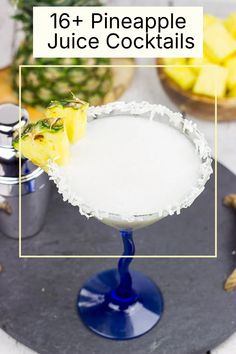 pineapple juice cocktail in a blue glass on a tray