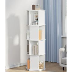 a white book shelf with books on it