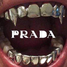 a close up of a person's mouth with braces on it and the words prada in front of them