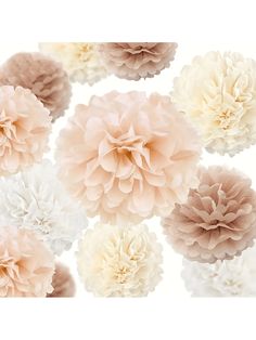 a bunch of pink and white flowers against a white background