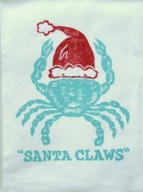 a towel with a crab wearing a santa hat