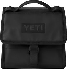 a black bag with the word yeti on it's front pocket and strap