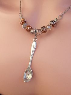 "I made you the coolest Tiny spoon Necklace. It measures 19\" can be adjusted to 20\". Spoon pendant measures .5\"W X 2\"L White dice, Cool beaded mini silver spoon necklace is handmade with quality materials, so its durable can accompany you for a long time. Necklace made for the flamethrower, kandi flipping spaceball, can make you more charming and eye-catching. Spoon necklace is Comfortable and easy for you to put right on. This Spoonie Necklace is the perfect jewelry gift for patients  with chronic illness, mom, girlfriend, daughter, friend, women. Now you can help raise awareness for chronic illnesses by wearing this cute silver spoonie necklace. For more like this please visit my website www.goatnecks.store" Tiny Spoon, Spoon Pendant, Time Necklace, Tiny Spoons, Spoon Necklace, Beautiful Chokers, Silver Spoon, Silver Spoons, Choker Necklaces