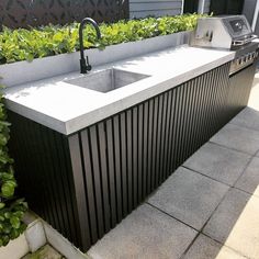 an outdoor kitchen is featured on instagram