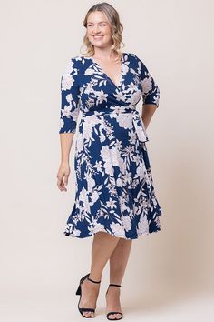 A timeless wardrobe essential, the Signature Print Wrap Dress effortlessly combines classic features—flattering princess seams, ¾ length sleeves, a figure-enhancing wrap-around silhouette, and a gracefully flowing midi or tea-length skirt.  This classic printed plus size wrap dress is sophisticated and seamlessly transitions from office to cocktail settings.  This true wrap around dress, tailored exclusively for curvy figures, is available in a range of plus sizes (0x,1x,2x,3x,4x,5x, 12,14,16,18,20,22,24,26,28,30, and 32). Wrap Dress With Sleeves, Plus Size Wrap Dress, Jumpsuit And Cardigan, Tea Length Skirt, Chic Cardigan, Dress With Sleeves, Evening Gown Dresses, Wrap Around Dress, Wedding Dresses For Sale