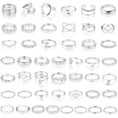 PRICES MAY VARY. VINTAGE RING KIT: You will get 47pcs knuckle rings with a combination of various styles such as CZ ring, twist ring, hollow ring, etc. Can be As Stacking Rings,Thumb Ring, Knuckle Rings. Multiple ways of stacking makes you unique every day. Great value for your money. PREMIUM-QUALITY: All rings are made of high-quality alloy materials combined with electroplating process, smooth surface, bright color, environmentally friendly materials, comfortable fit design, suitable for most Ring Index Finger, Silver Ring Sets, Rings Multiple, Rings Pack, Rings Set For Women, Index Finger Ring, Hollow Ring, Middle Finger Ring, Rings Dainty