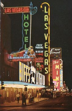 the las vegas hotel and casino sign lit up at night