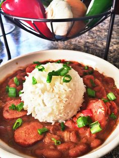 a white plate topped with beans and rice