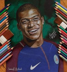 a drawing of a smiling soccer player surrounded by colored pencils