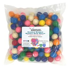 a bag filled with lots of different colored balls