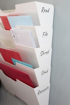 file folders are stacked on top of each other and labeled with the words read, file, shared, receipts