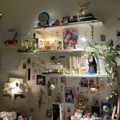 a room filled with lots of clutter and decorations