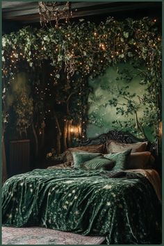 a bed with green comforter and pillows in front of a large tree covered wall