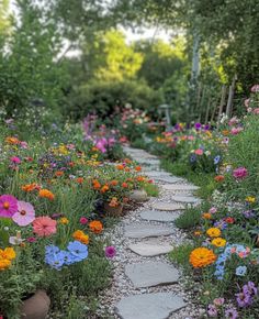 a stone path surrounded by colorful flowers and greenery