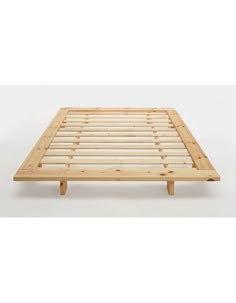 a bed frame with wooden slats on it