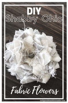 a white flower with the words shabby chic fabric flowers on it's side