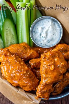 smoked chicken wings tossed in a spicy garlic parmesan buffalo sauce served with ranch celery and carrot sticks Garlic Buffalo Wings, Garlic Buffalo Sauce, Garlic Wing Sauce, Buffalo Parmesan Wings, Baked Parmesan Chicken Wings, Garlic Buffalo Wing Sauce, Garlic Wings Sauce