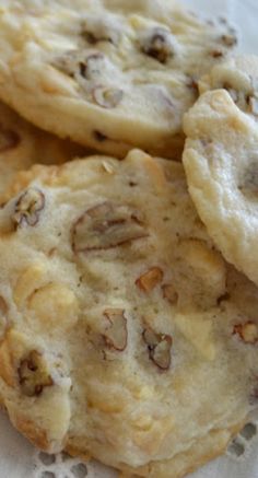 three cookies on a doily with chocolate chips