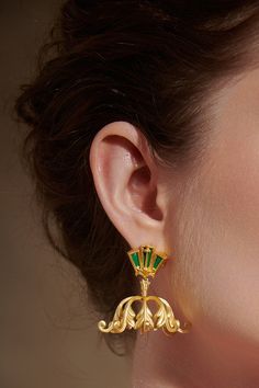 The Indian inspired jhumka earrings earrings feature intricate foliage patterns. They are handcrafted using ancient filigree and embossing techniques finished in 18K dull gold plating. The top motif is backed with traditional enamelling adding to the uniqueness and grandeur of the jhumkis. They are lightweight so you can enjoy wearing them for longer durations. They are modern yet traditional so versatile enough to style with desi or western looks. Whether you're styling them with a black satin Ornate Jhumkas For Pierced Ears, Elegant Green Earrings For Ceremonial Occasions, Elegant Ceremonial Jhumkas, Banarsi Sari, Western Looks, Rococo Era, Ornate Necklace, Baroque Jewelry, Embossing Techniques