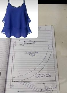 an image of a blue top and some drawings