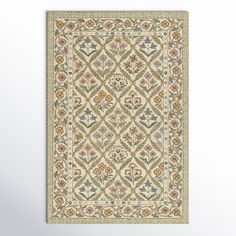 a rug with an ornate design on the front and back side, in beige tones