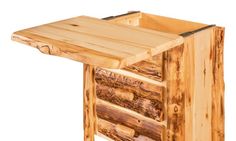 a wooden table with two drawers made out of logs