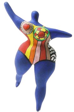 a blue figurine with an artistic design on it's body and legs