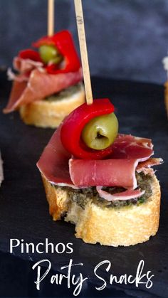 mini sandwiches with olives, ham and pickles on them are ready to be eaten