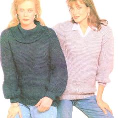 two women in sweaters and jeans posing for the camera